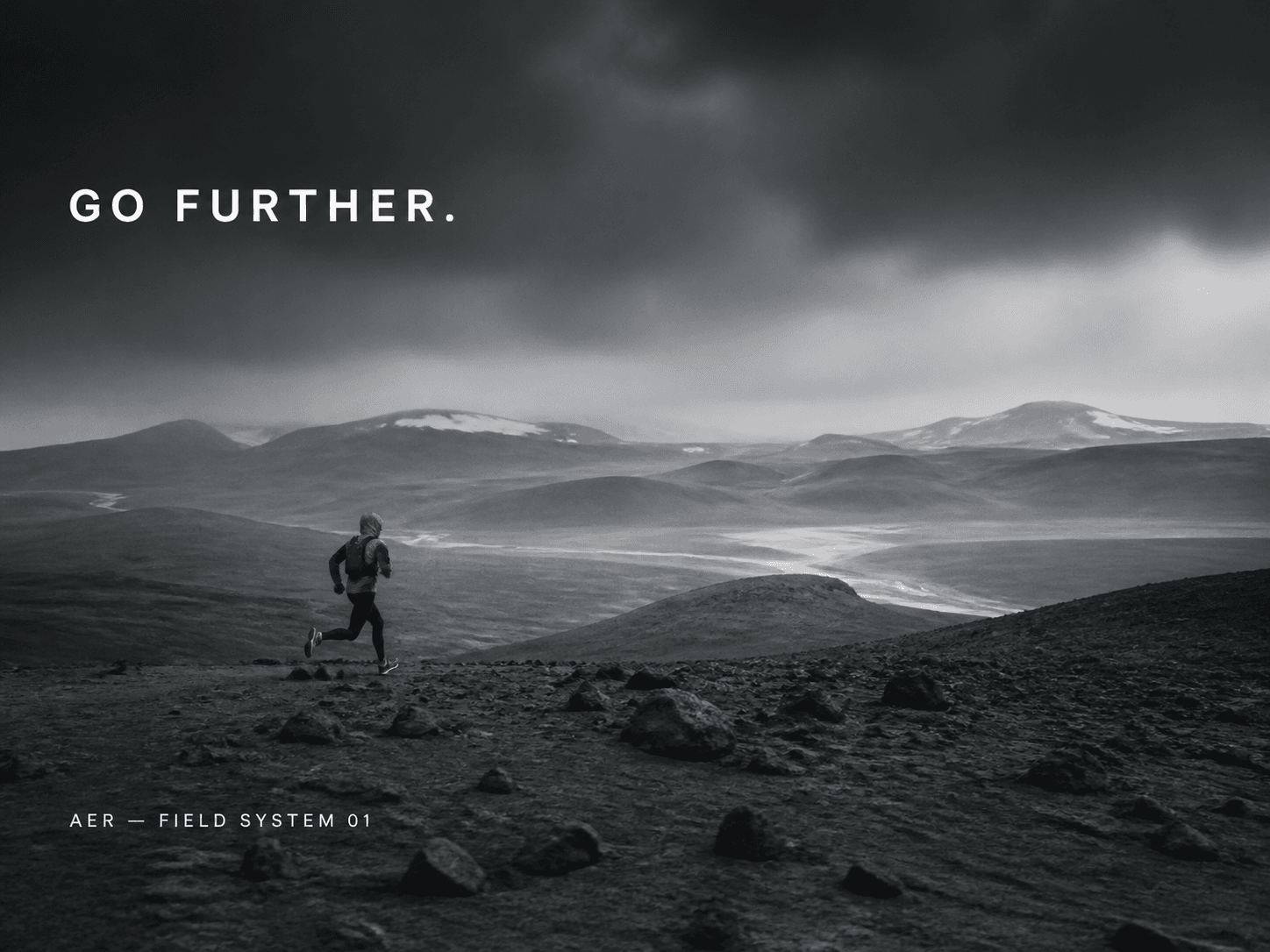 AER outdoor apparel campaign showing a runner crossing a volcanic landscape